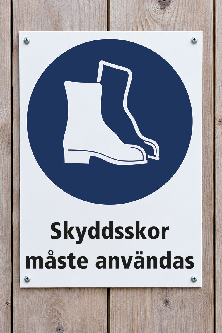 Påbudskylt på trävägg, Skyddsskor
