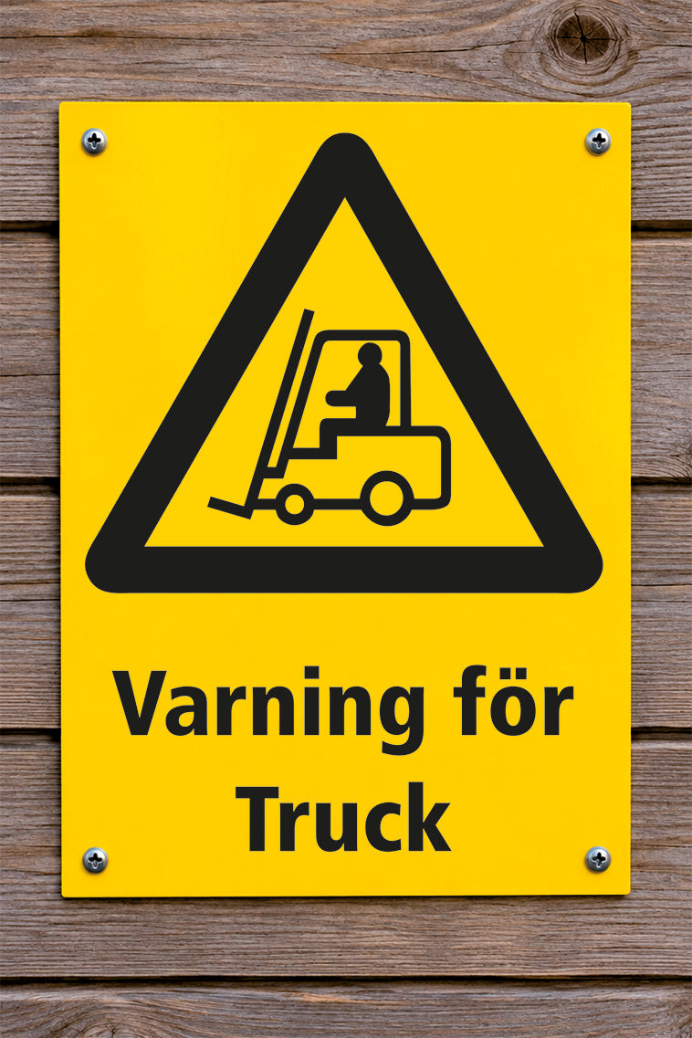 Varningsskylt på trävägg, Truck