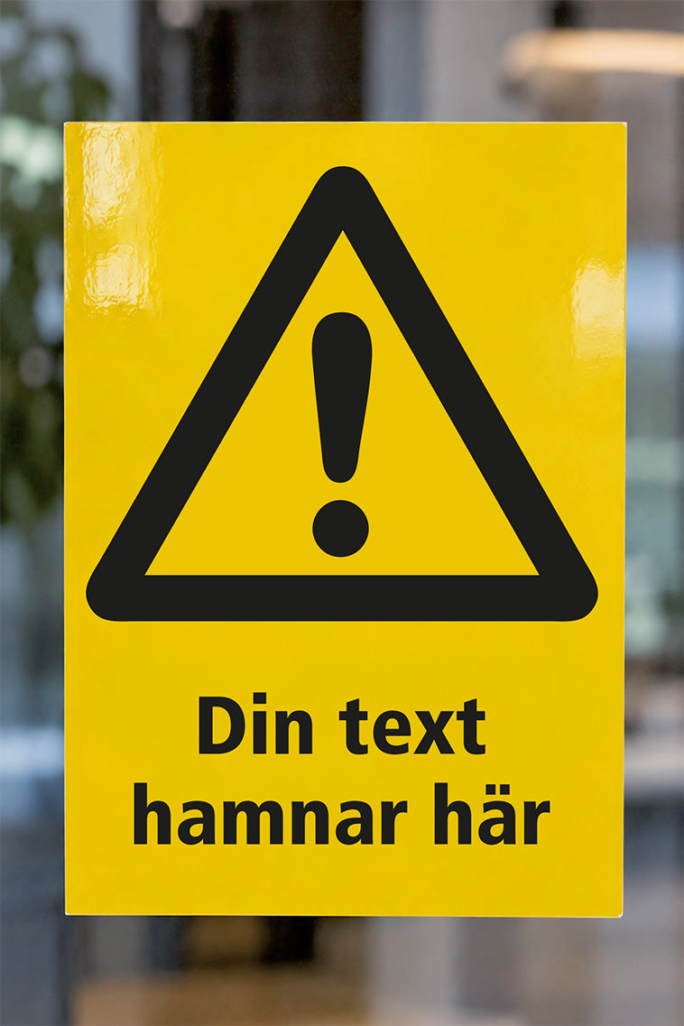Varningsdekal på glas