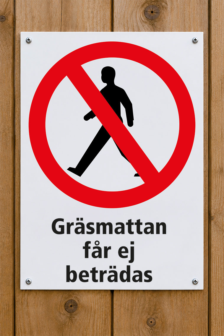 Förbudsskylt på trävägg, Gräsmattan får ej beträdas