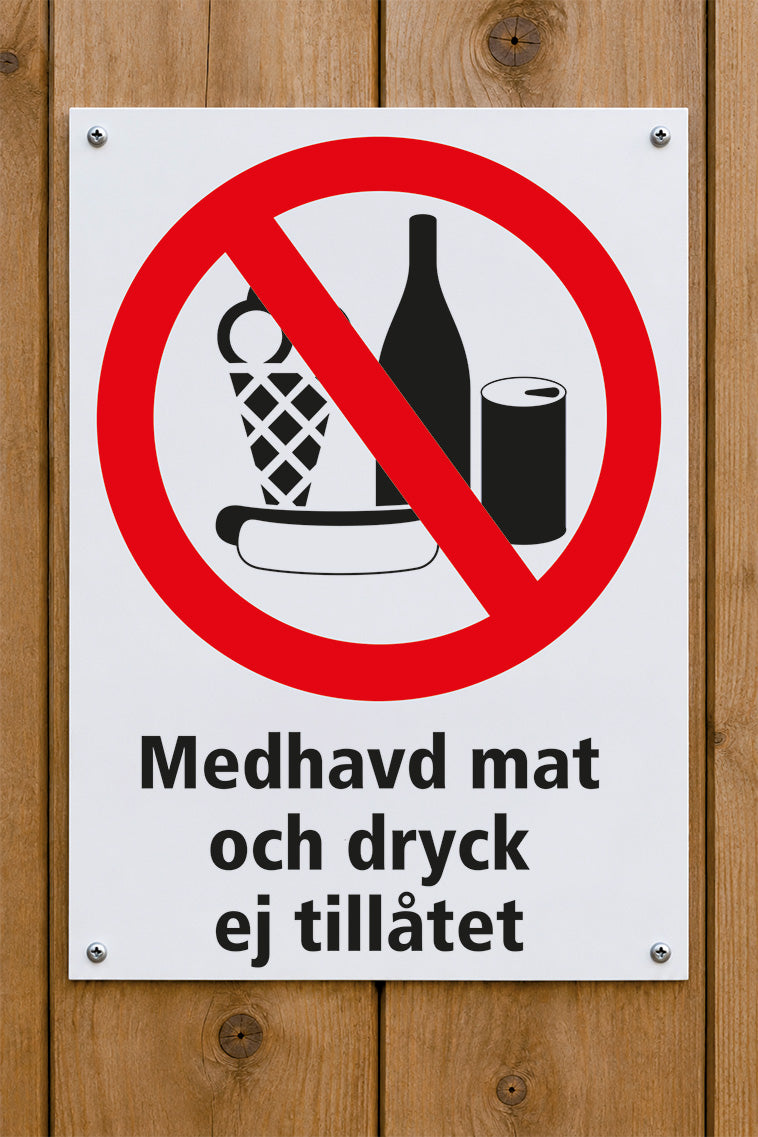 Förbudsskylt på trävägg, Medhavd mat och dryck ej tillåtet
