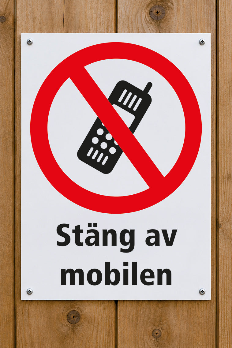 Förbudsskylt på trävägg, Stäng av mobilen