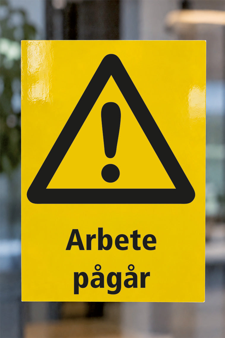 Varningsdekal på glas, Arbete pågår