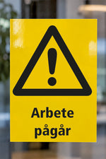 Varningsdekal Arbete pågår