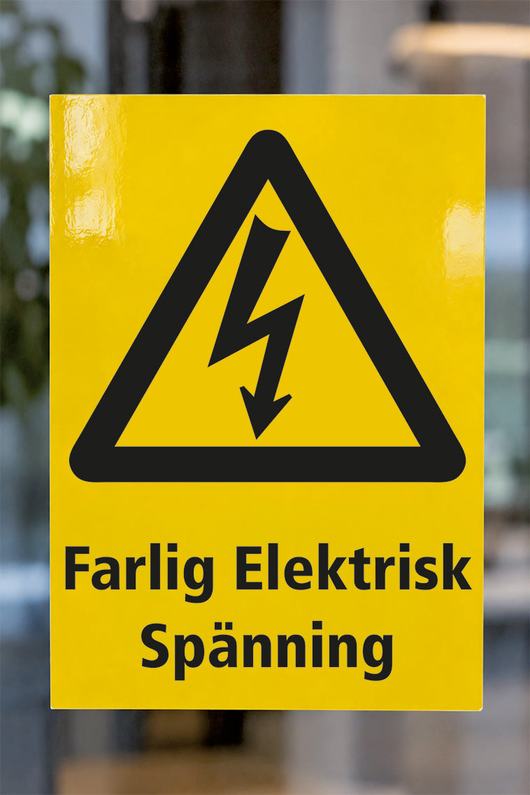 Varningsdekal på glas, Farlig elektrisk spänning