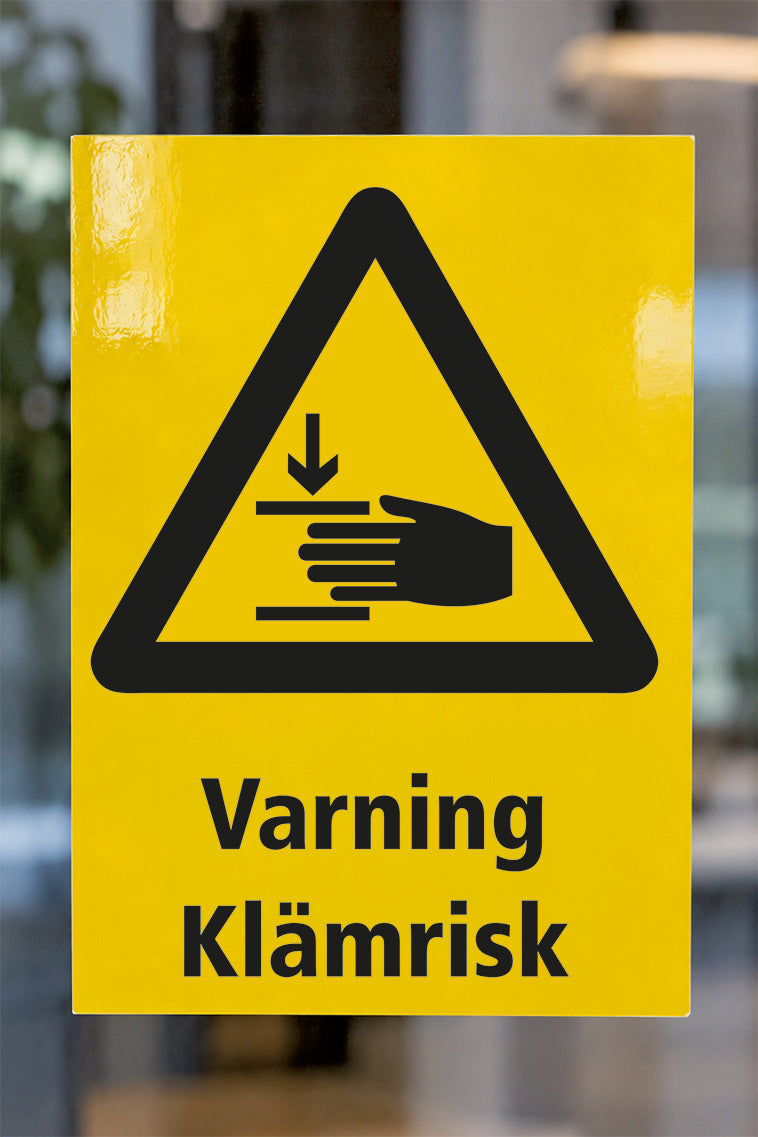 Varningsdekal på glas, Klämrisk