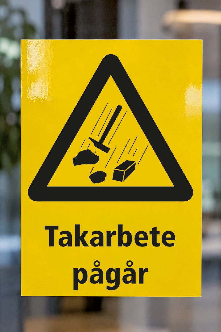 Varningsdekal på glas, Takarbete pågår