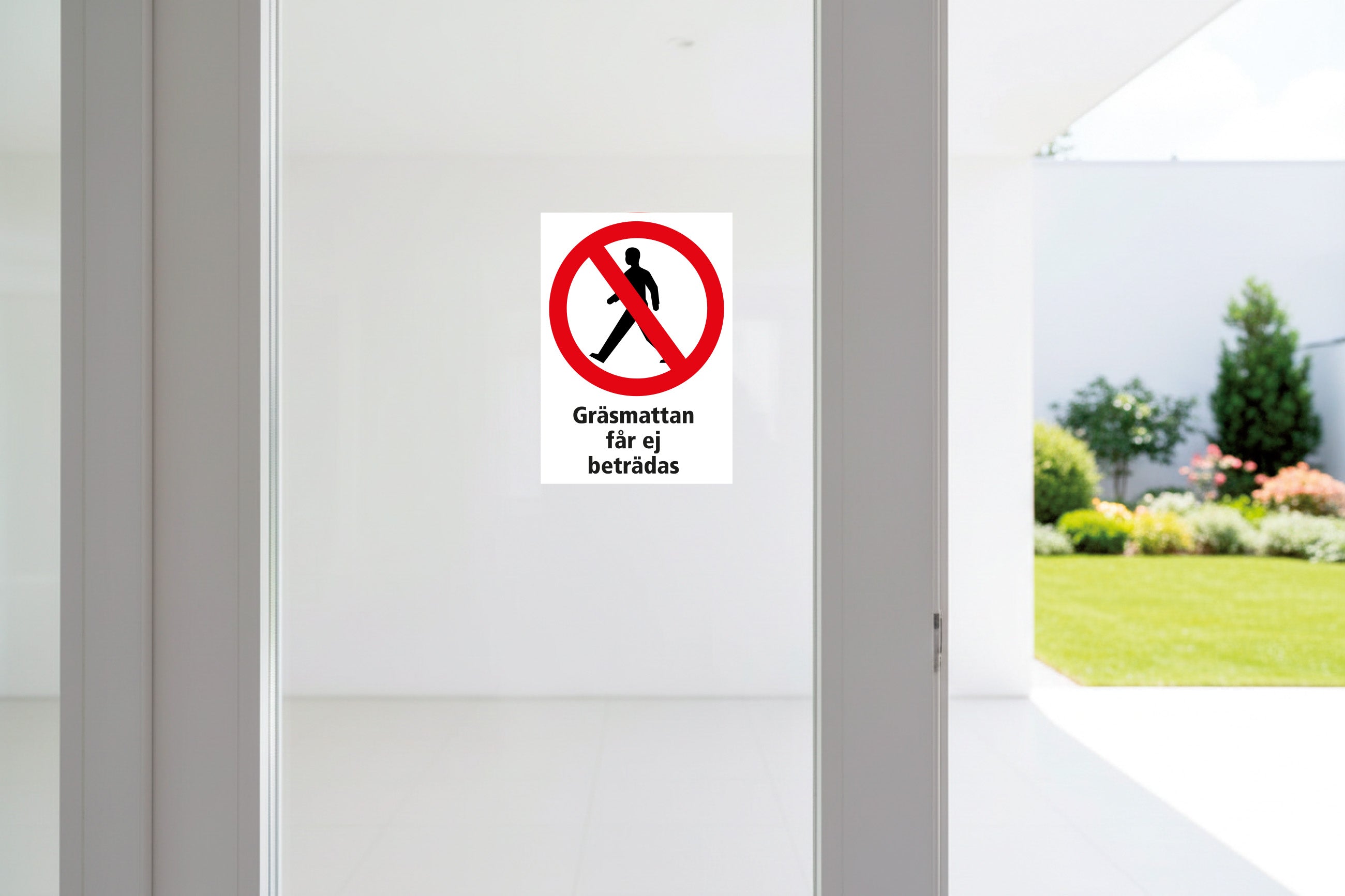 Dekal gräsmattan får ej beträdas